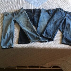 Four pairs of GUC 3T denim jeans